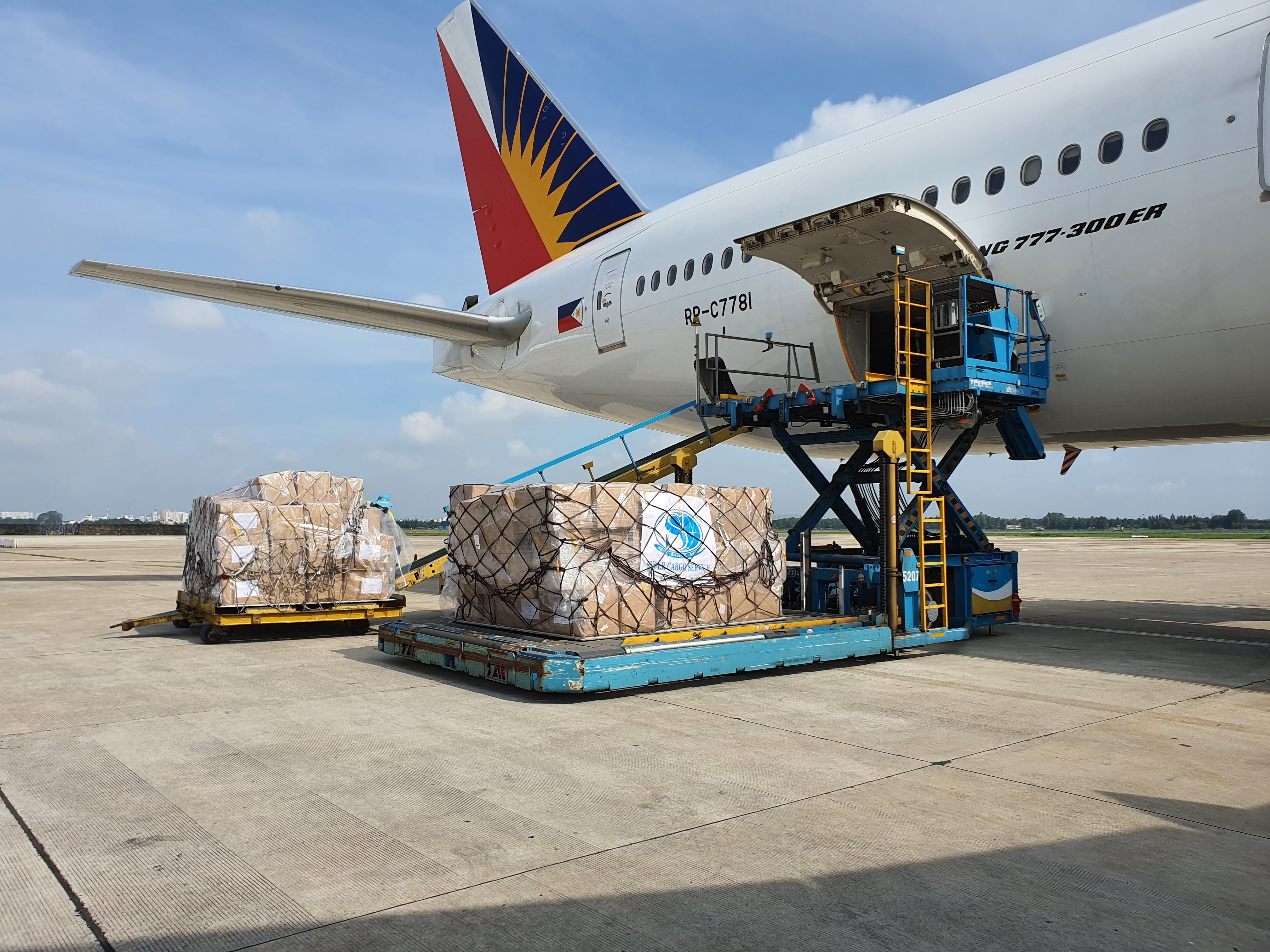 Cargo plane being loaded with air freight shipments