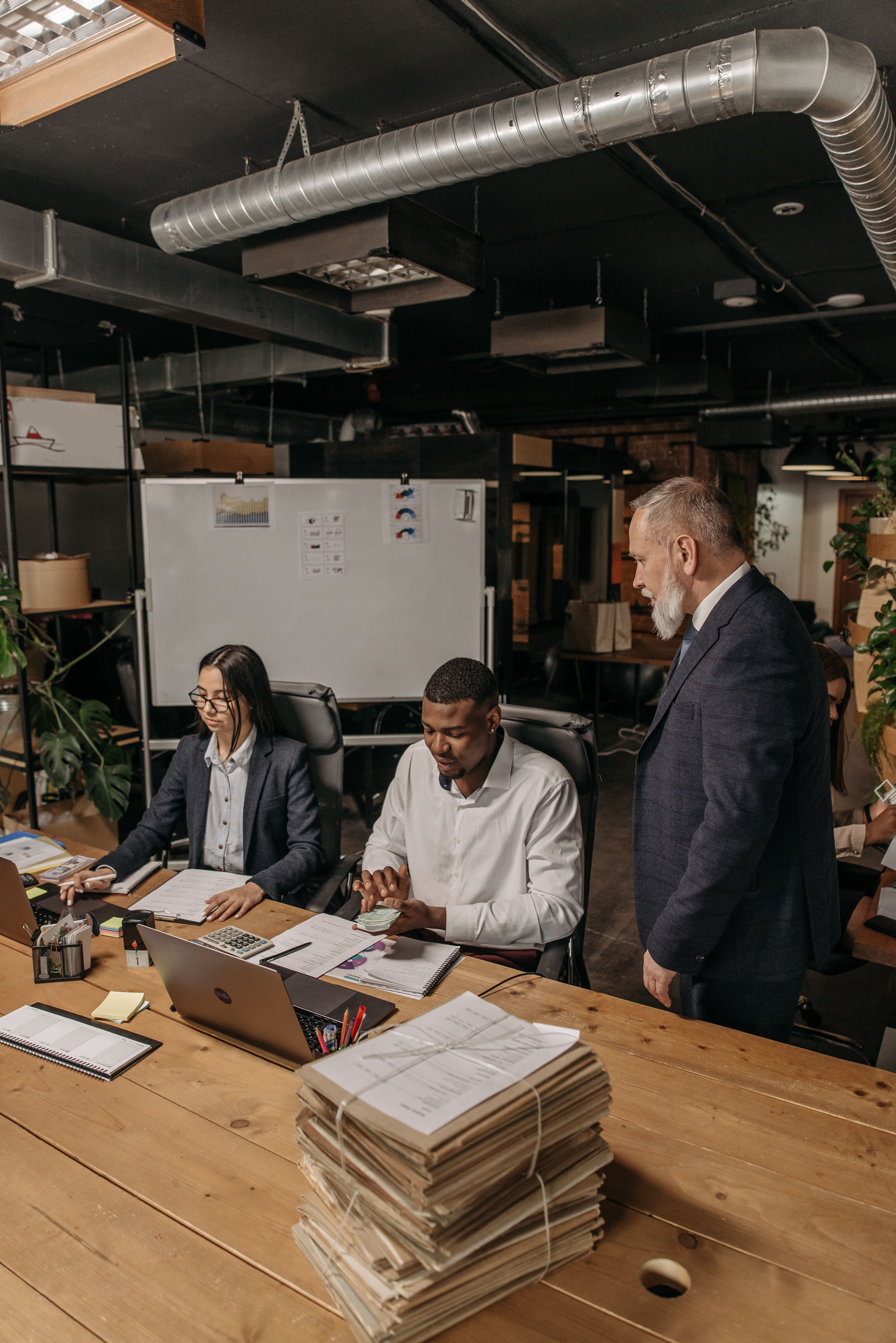 Office team reviewing a corporate bulk shipping account